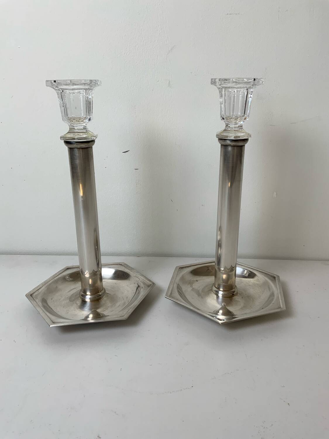 Pair of silver-plated metal candlesticks