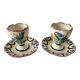 Pair of HB Quimper egg cups with integrated pedestal base, floral decoration