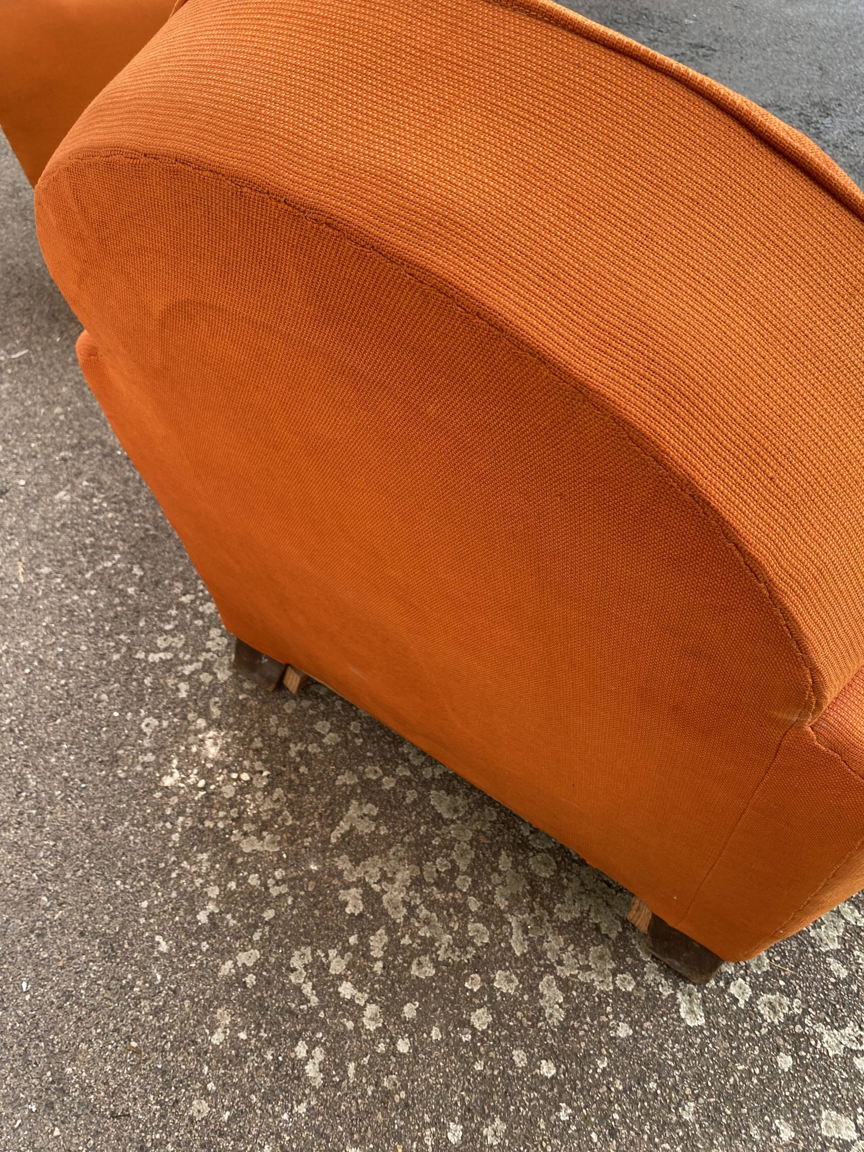 Pair of vintage orange club chairs