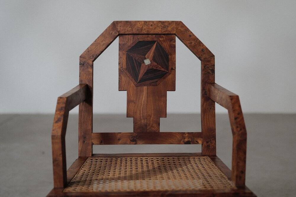 Art Deco armchair, marquetry and cane, circa 1930
