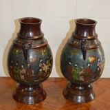 Asian vases in partitioned bronze