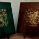 Two panels in lacquer and gold by Pierre Bobot.