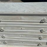Old chest of drawers in bleached wood with white marble top