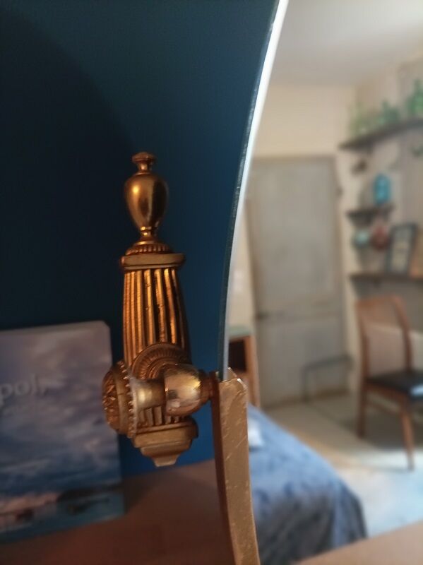 Oval mirror patinated brass frame art deco