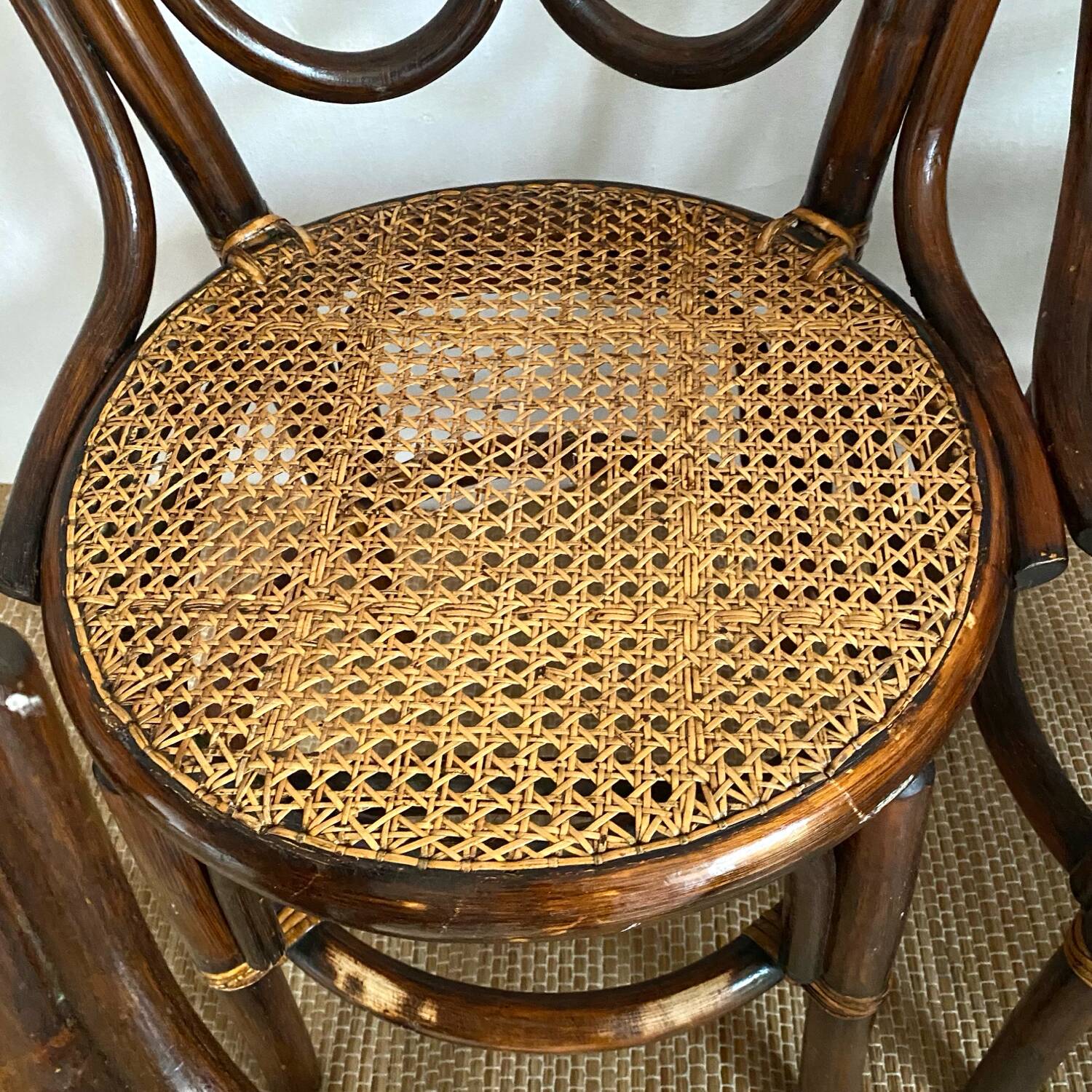 Rattan and cane bistro chairs