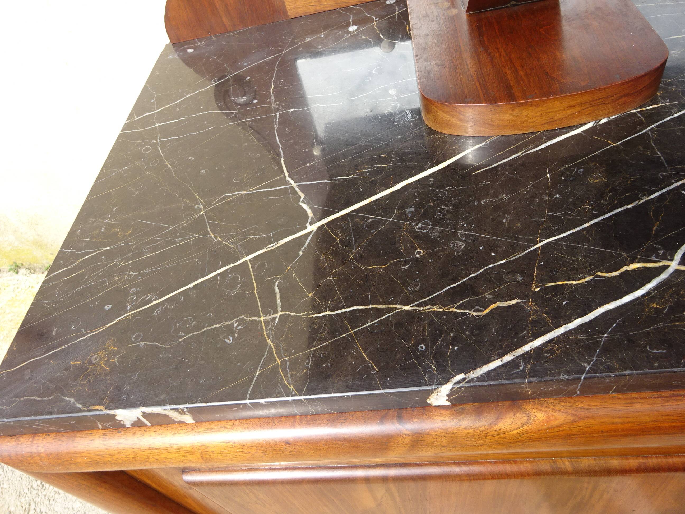Solid walnut sideboard, moustache legs, black marble top.