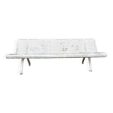 Old perforated metal garden bench