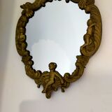 Gilded bronze mirror with angels and scrolls