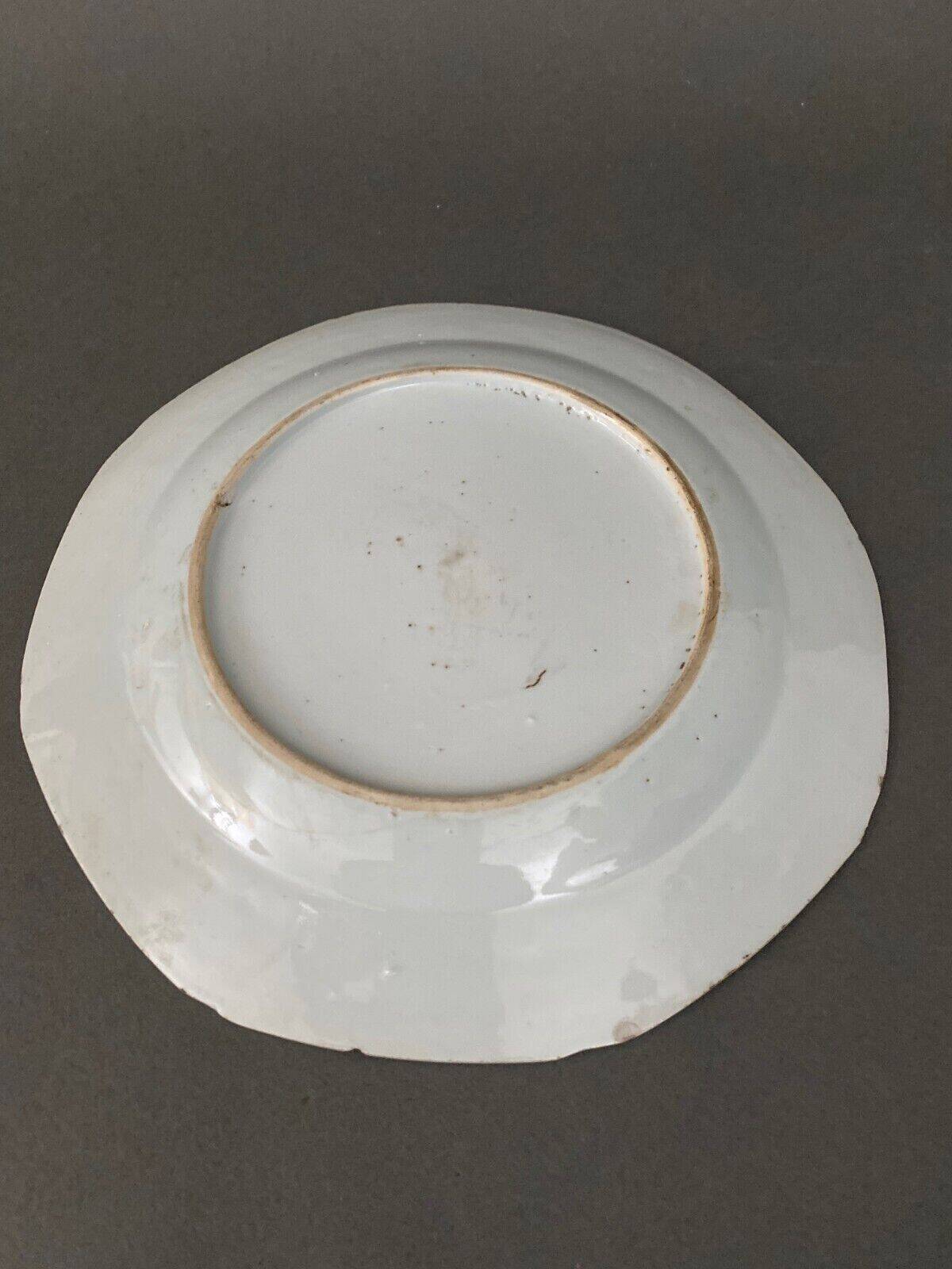 Blue and white China plate decorated with butterflies late 19th century