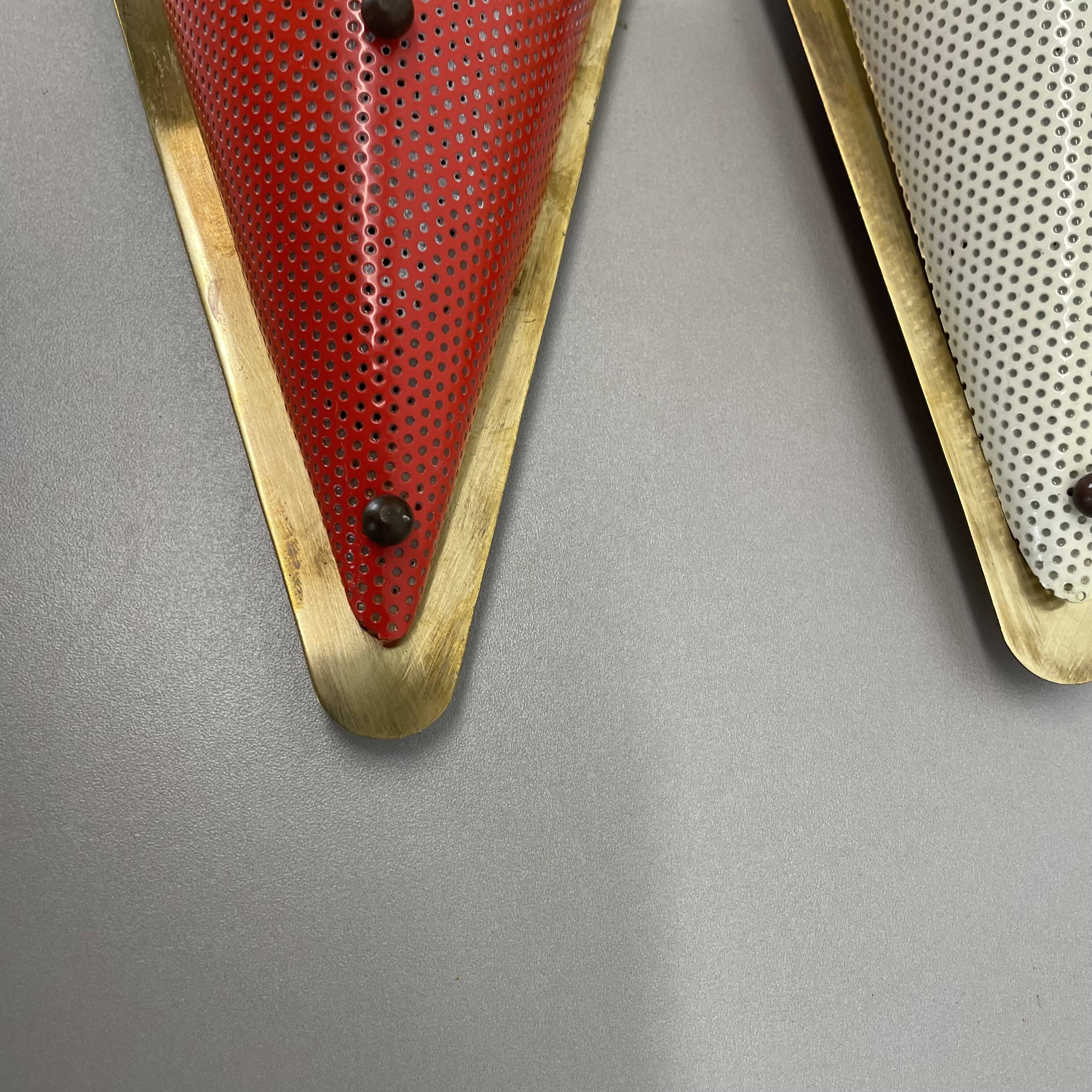 Set of two hole pattern theatre wall light sconces, france, 1950