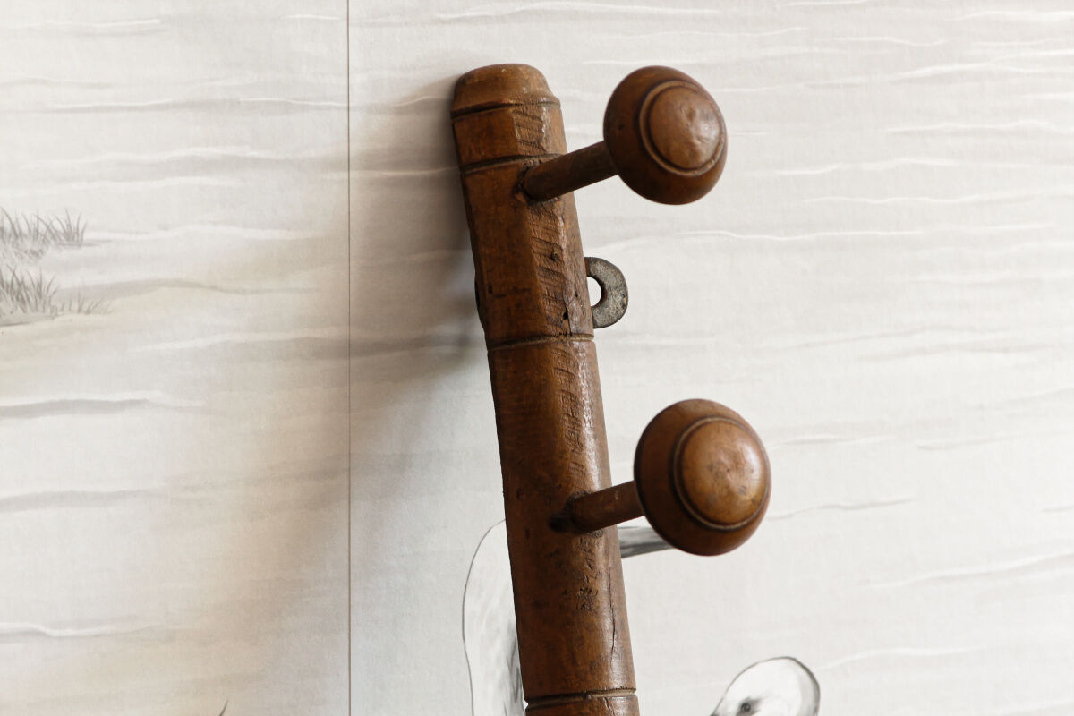 Wall mounted wooden coat rack turned