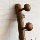 Wall mounted wooden coat rack turned