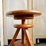 Wooden tripod stool with screw