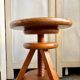 Wooden tripod stool with screw