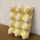 Vintage yellow ceramic egg holder