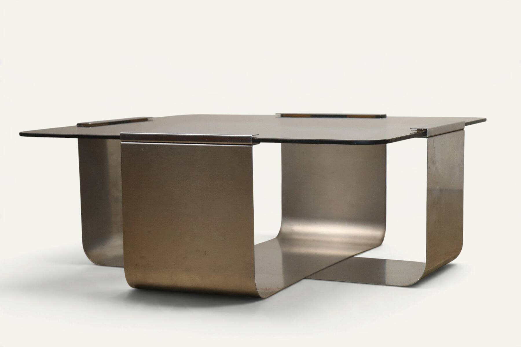 Brushed steel and smoked glass coffee table, by François Monnet – 1970s