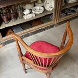 Corner armchair, dark wood and red velvet office chair.