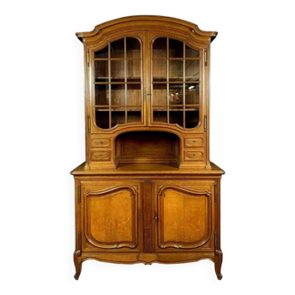 Louis XV style double body bookcase in blond oak with animated shapes
