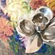 Pair of silver metal flower candle holders