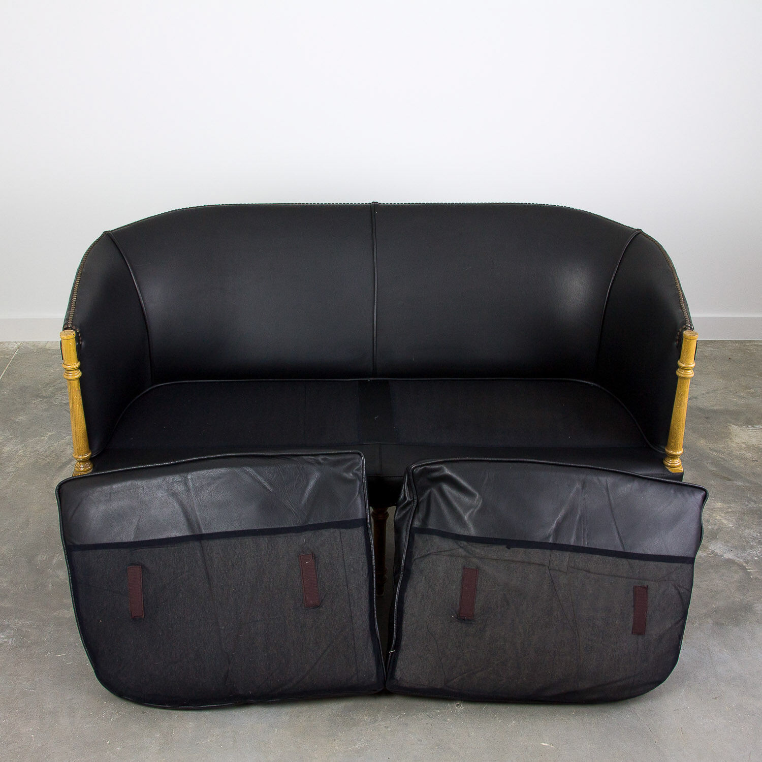 Black leather club sofa