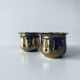 Pair of brass cord pot covers