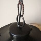 Large hanging lantern in wrought iron and opaque yellow-orange windows