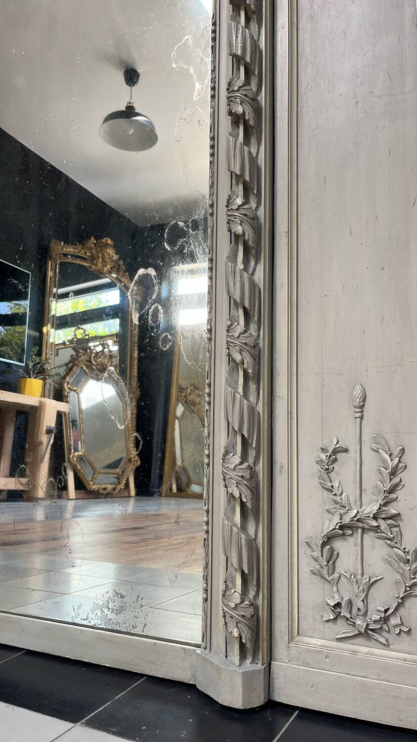 Important woodwork, 176.5cm/158cm 19th century fireplace mirror, quilted glass, parquet on the back.