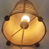 Lamp to be laid in rattan and fabric