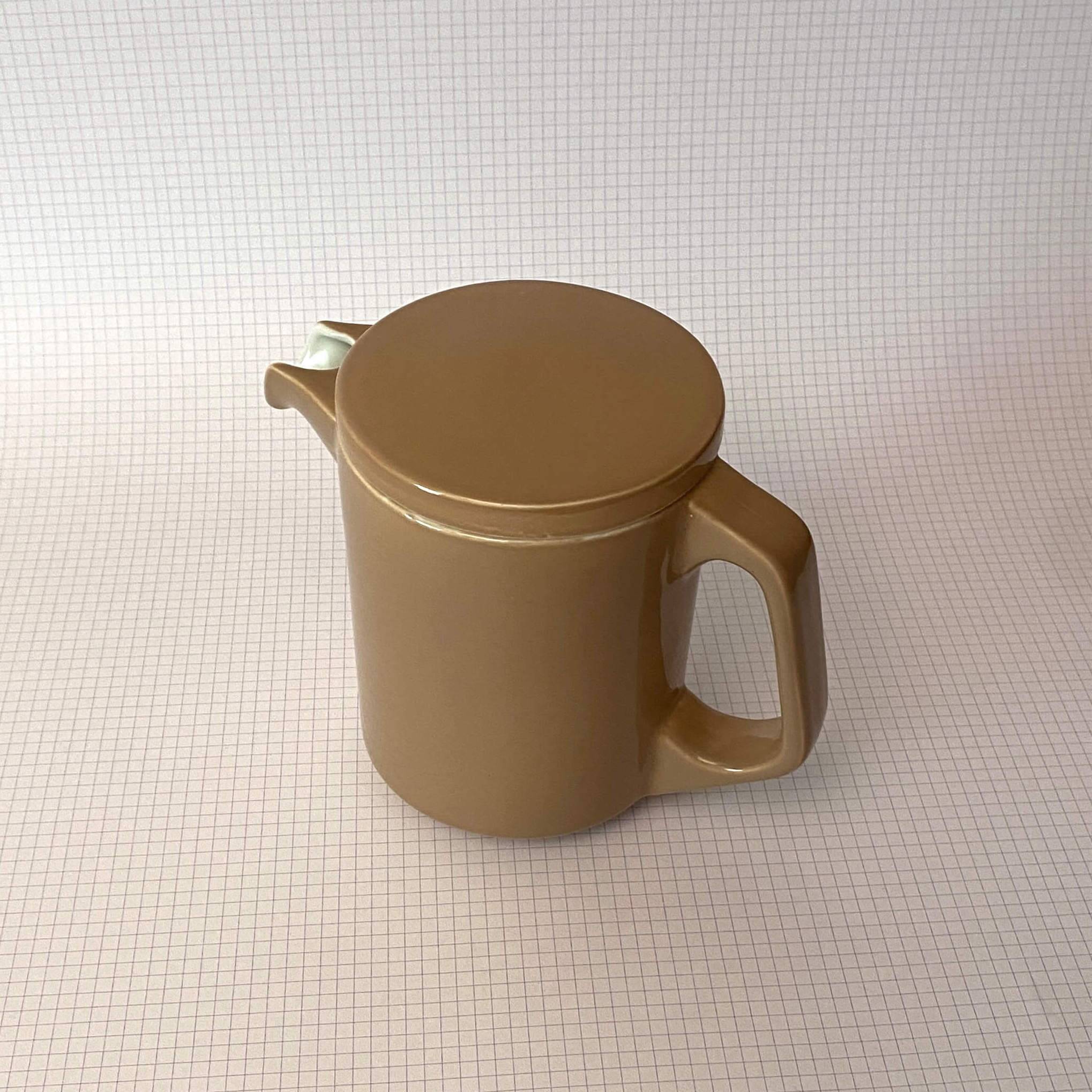 Brown ceramic pitcher