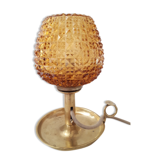 Vintage amber diamond tip lamp mounted on candle holder