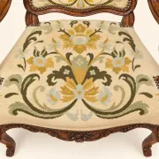 Louis XV cabriolet armchair, carved walnut, petit point tapestry, 18th century.