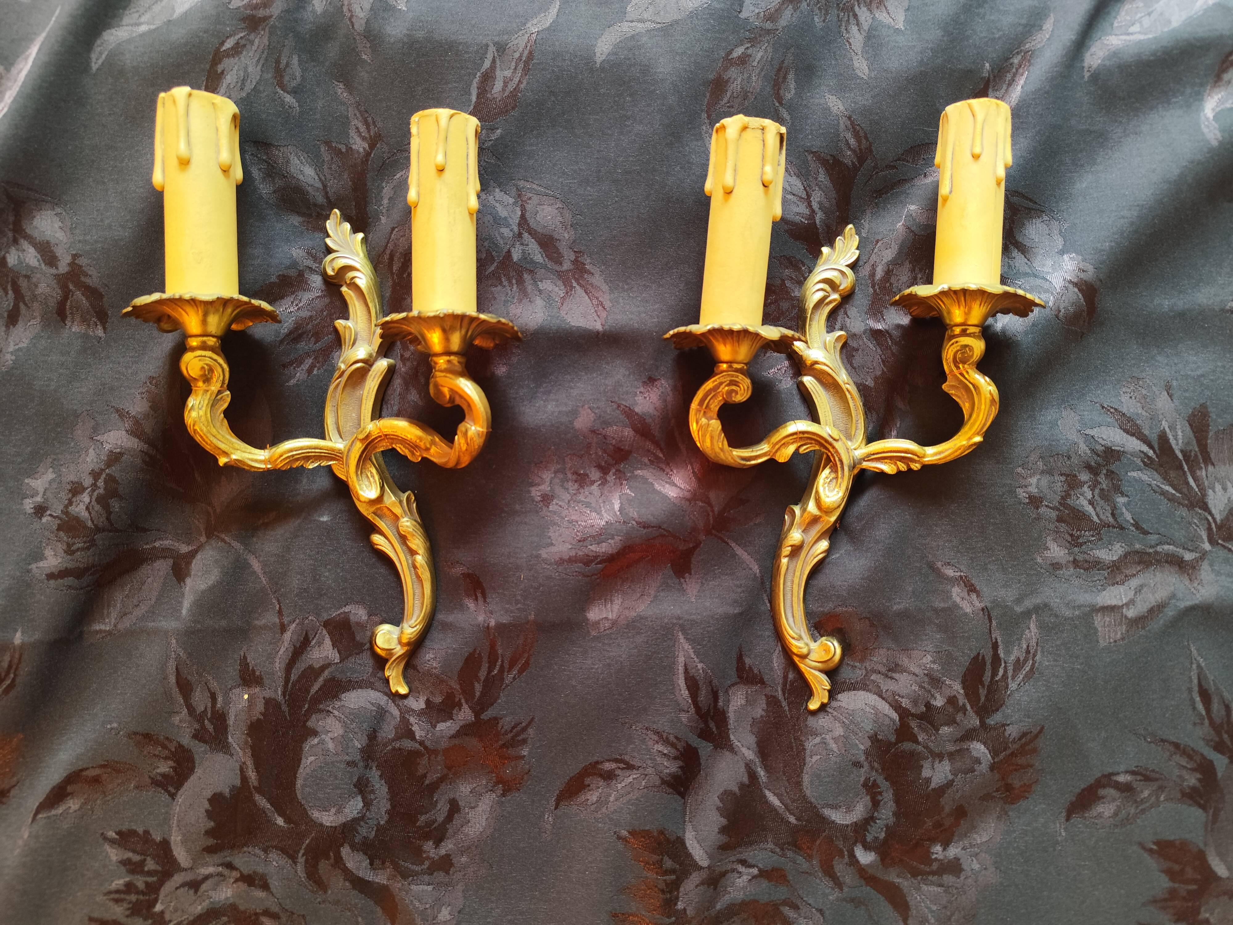 Pair of 19th century Louis XV style gilt bronze wall lights with 2 branches
