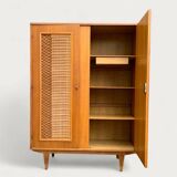 Rattan wardrobe and its compass-legged chest of drawers, 1960