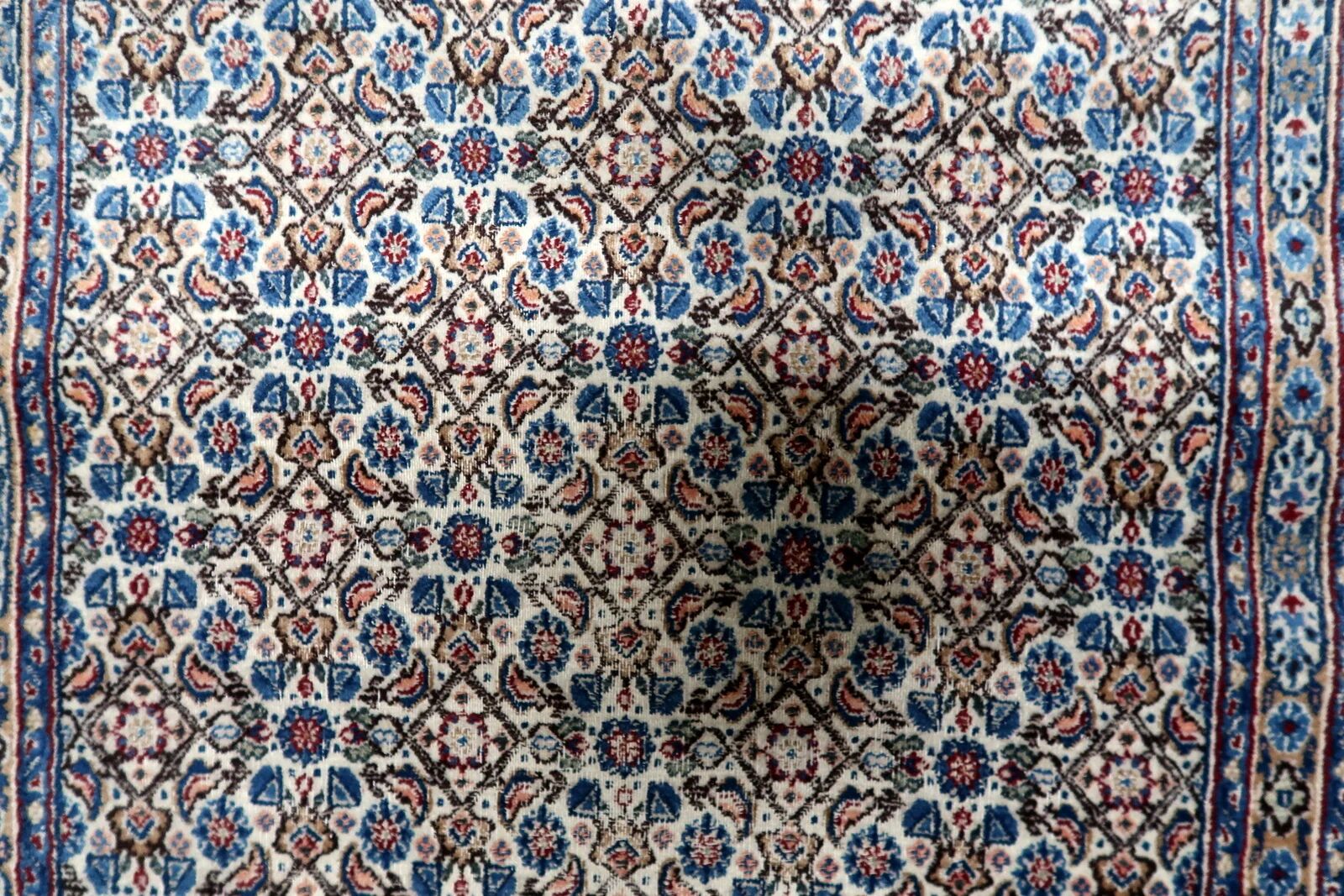 1950s handmade wool floral rug, ivory and blue, 98 × 145 cm