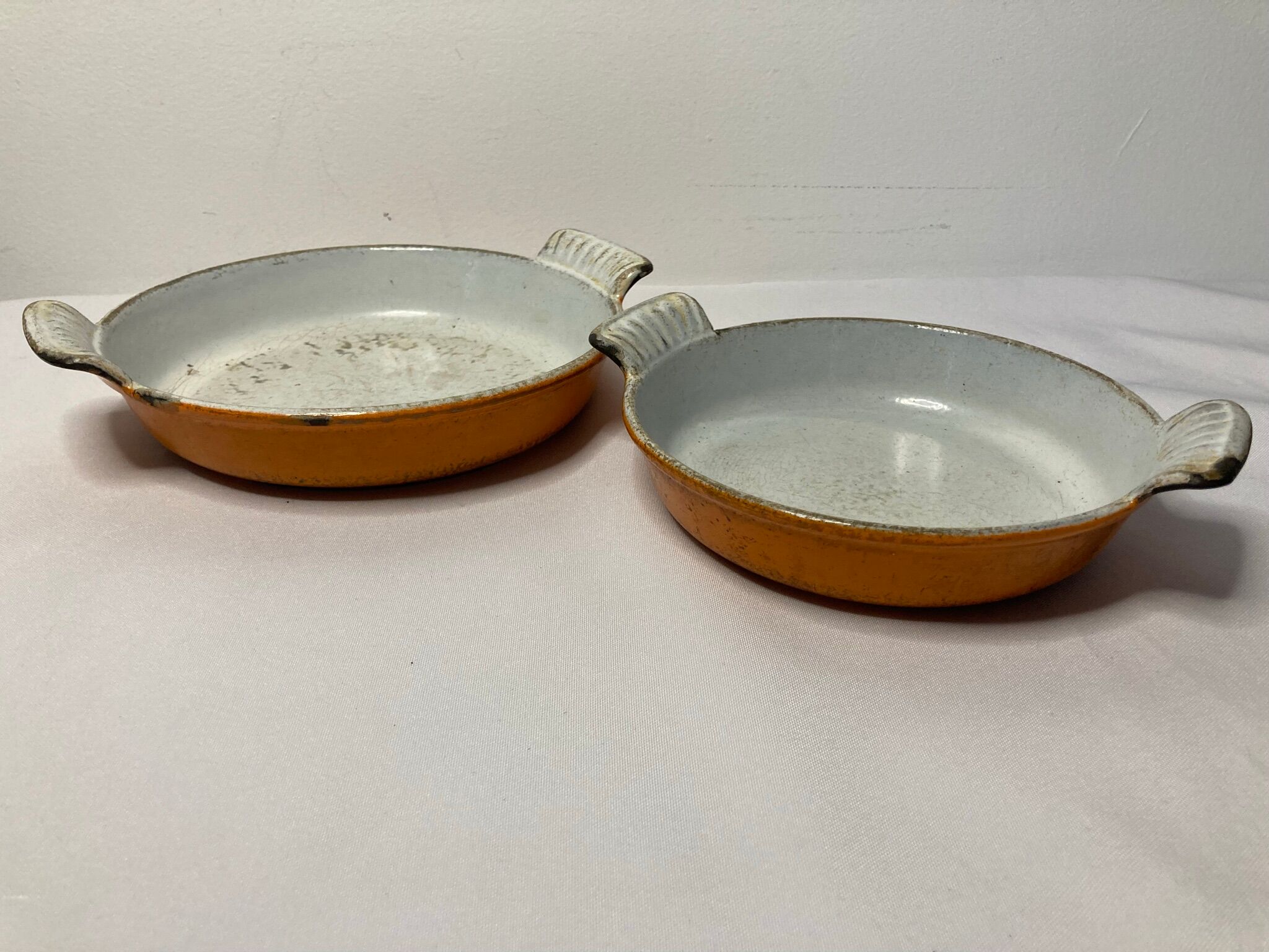 Vintage two dishes in enamelled cast iron orange dru