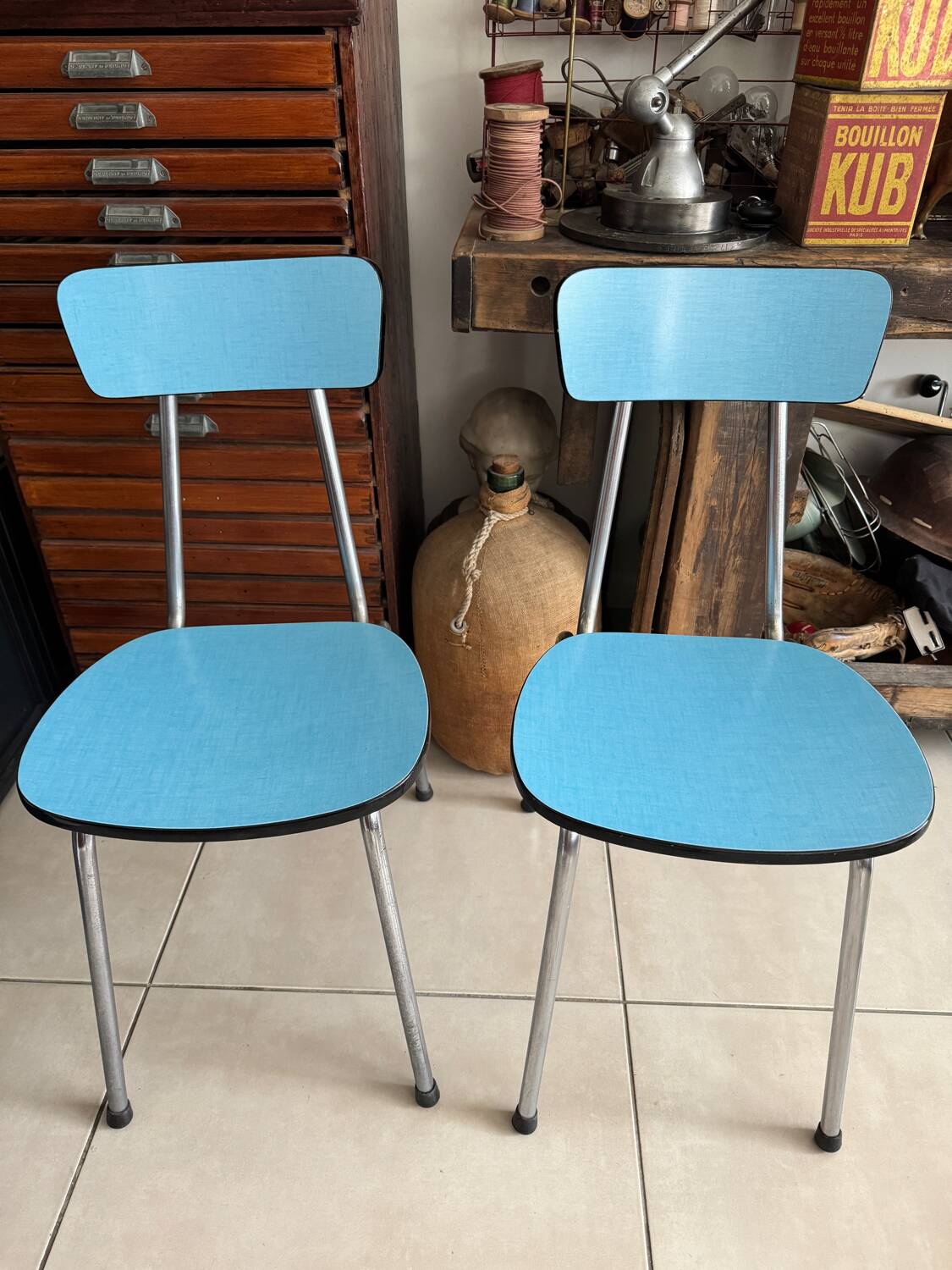 Pair of vintage blue Formica chairs