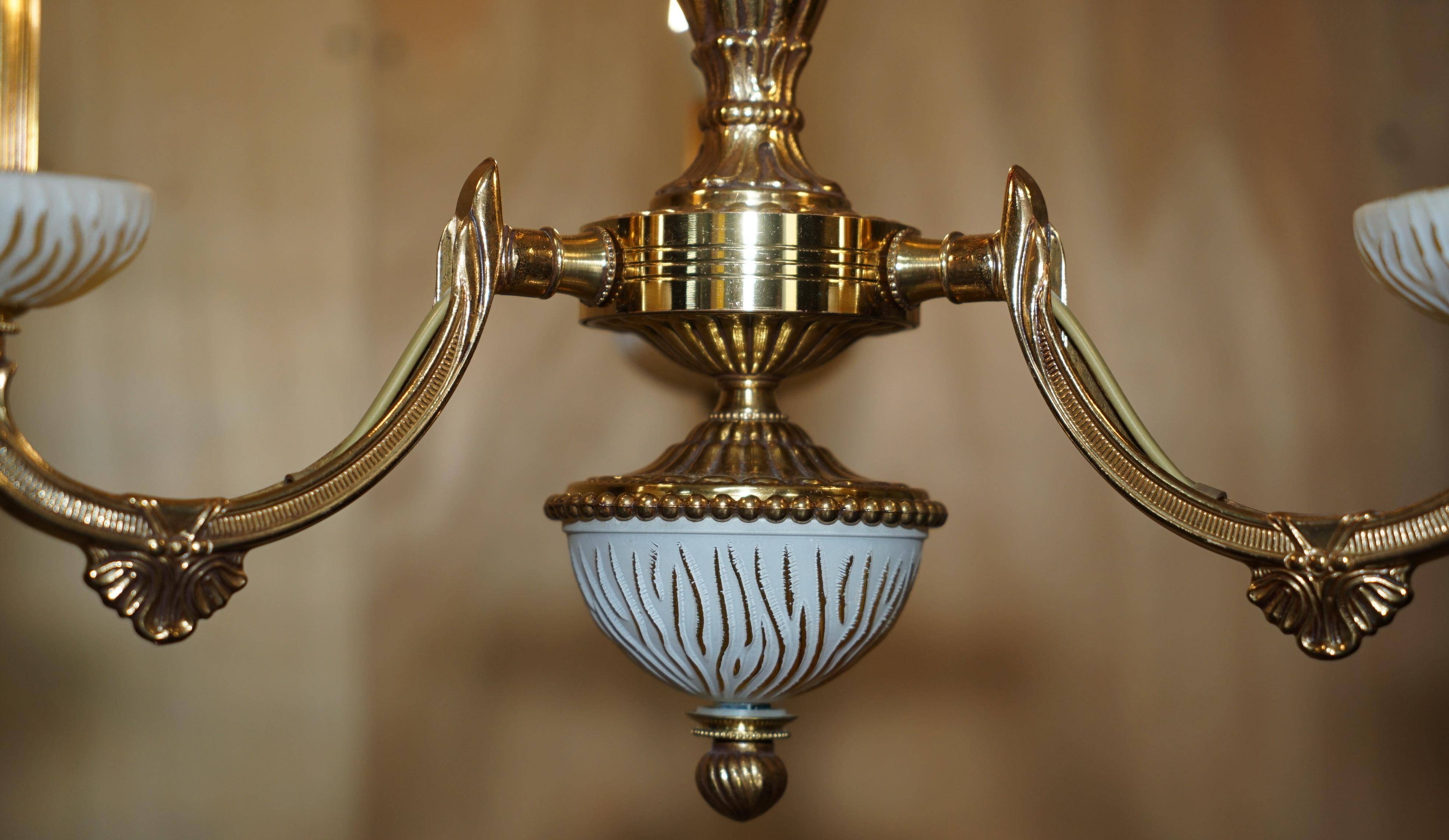 Reccagni chandelier in bronze and frosted glass.
