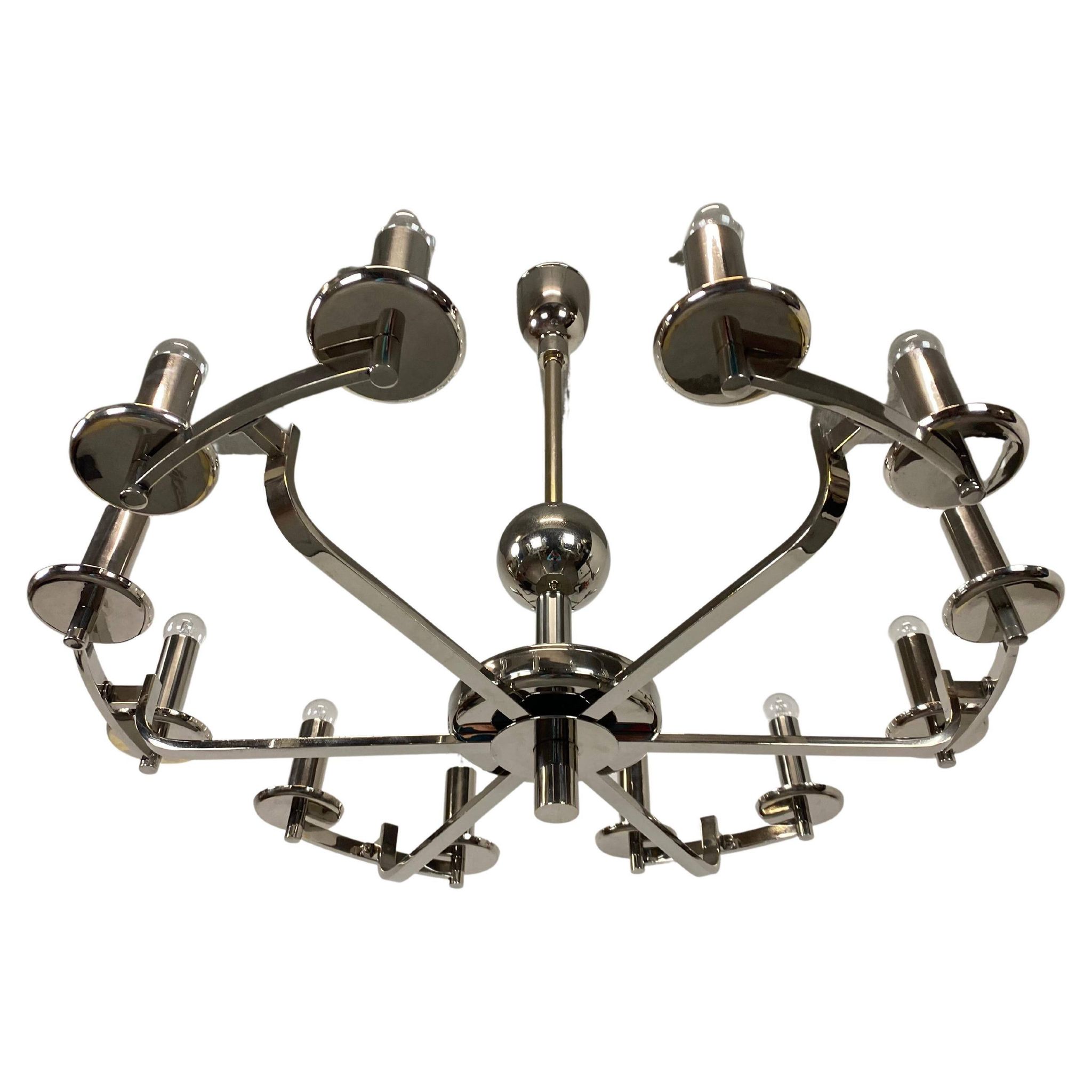 Large Bauhaus chandelier with two wall sconces.