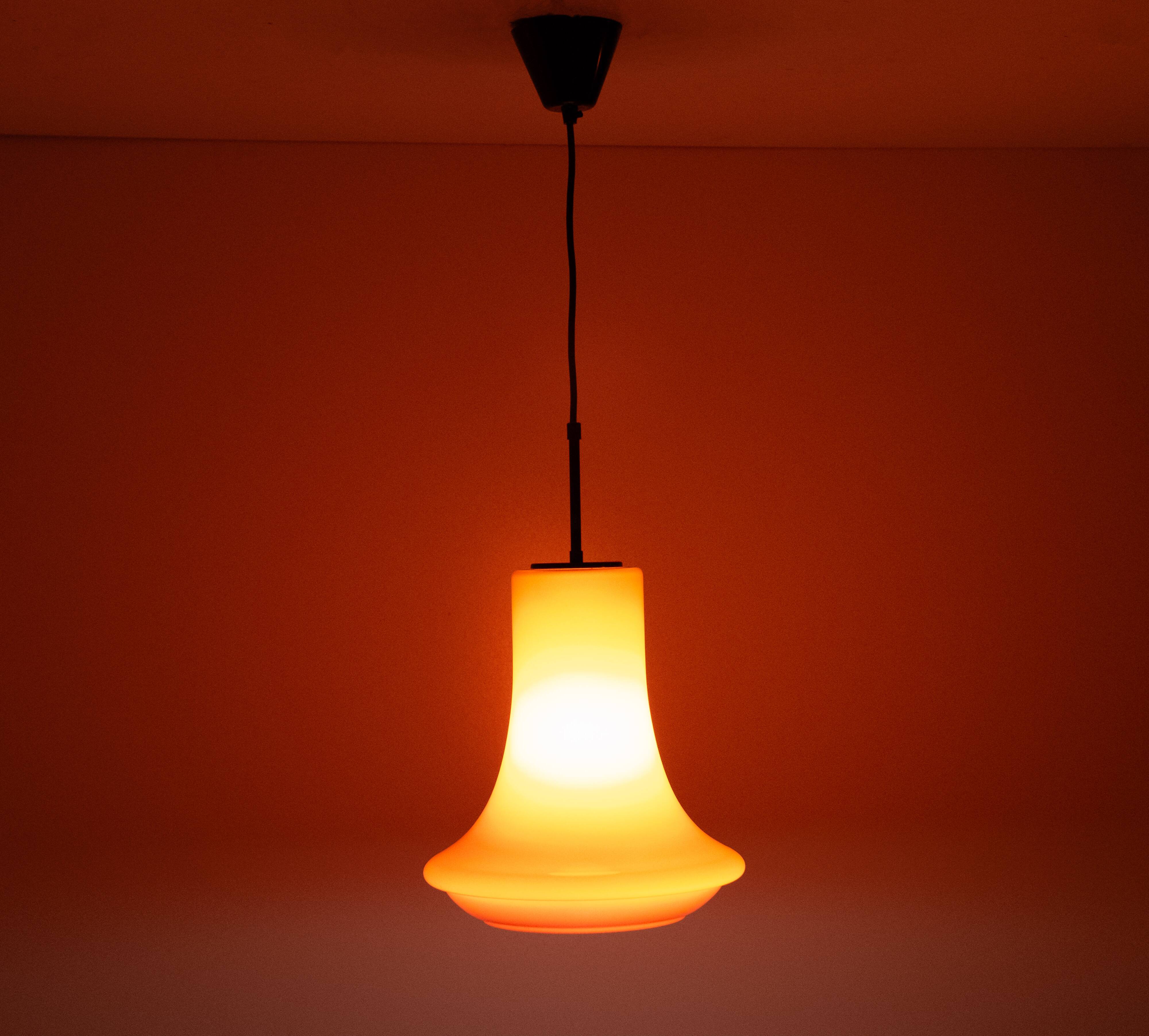 Dark red glass pendant light by Viktor Berndt for Flygsfors Sweden 1960s