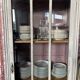 Small Parisian Art Deco glass cabinet with white patina - a timeless classic.