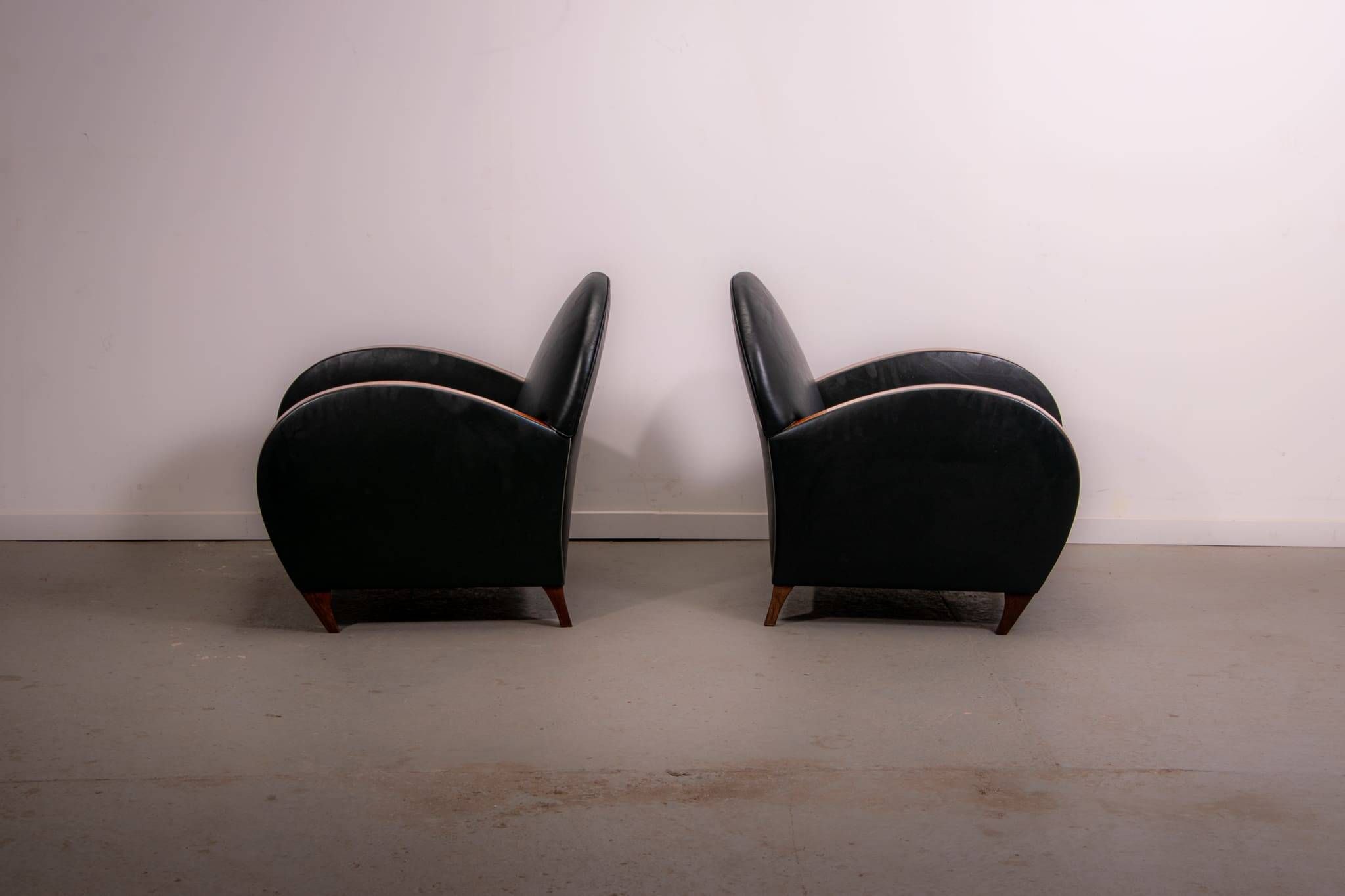 Pair of mid-century leather armchairs, circa 1970, made in Belgium.