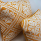 Square orange graphic cushion
