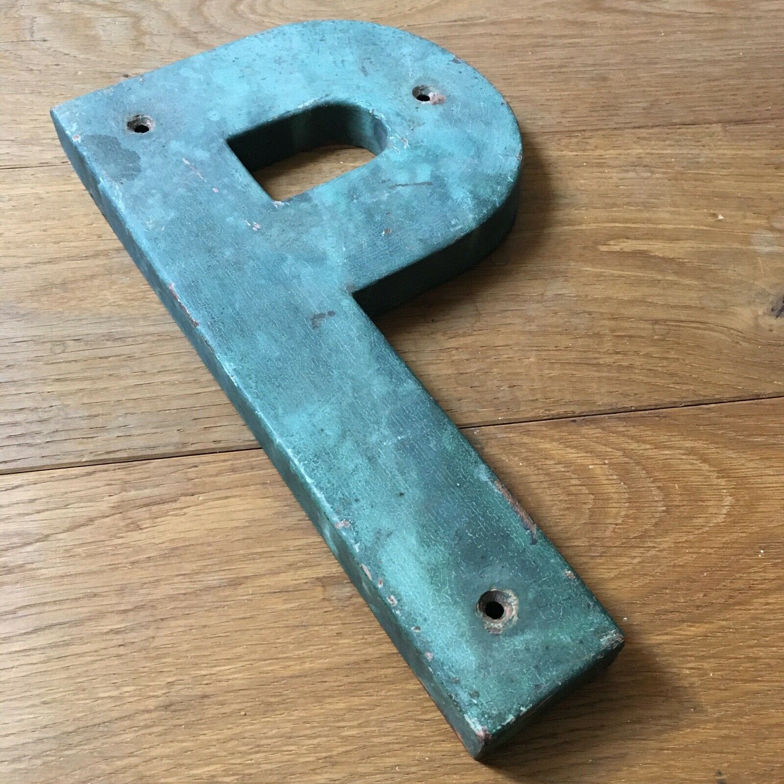 Ancient letter sign metal P