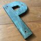 Ancient letter sign metal P