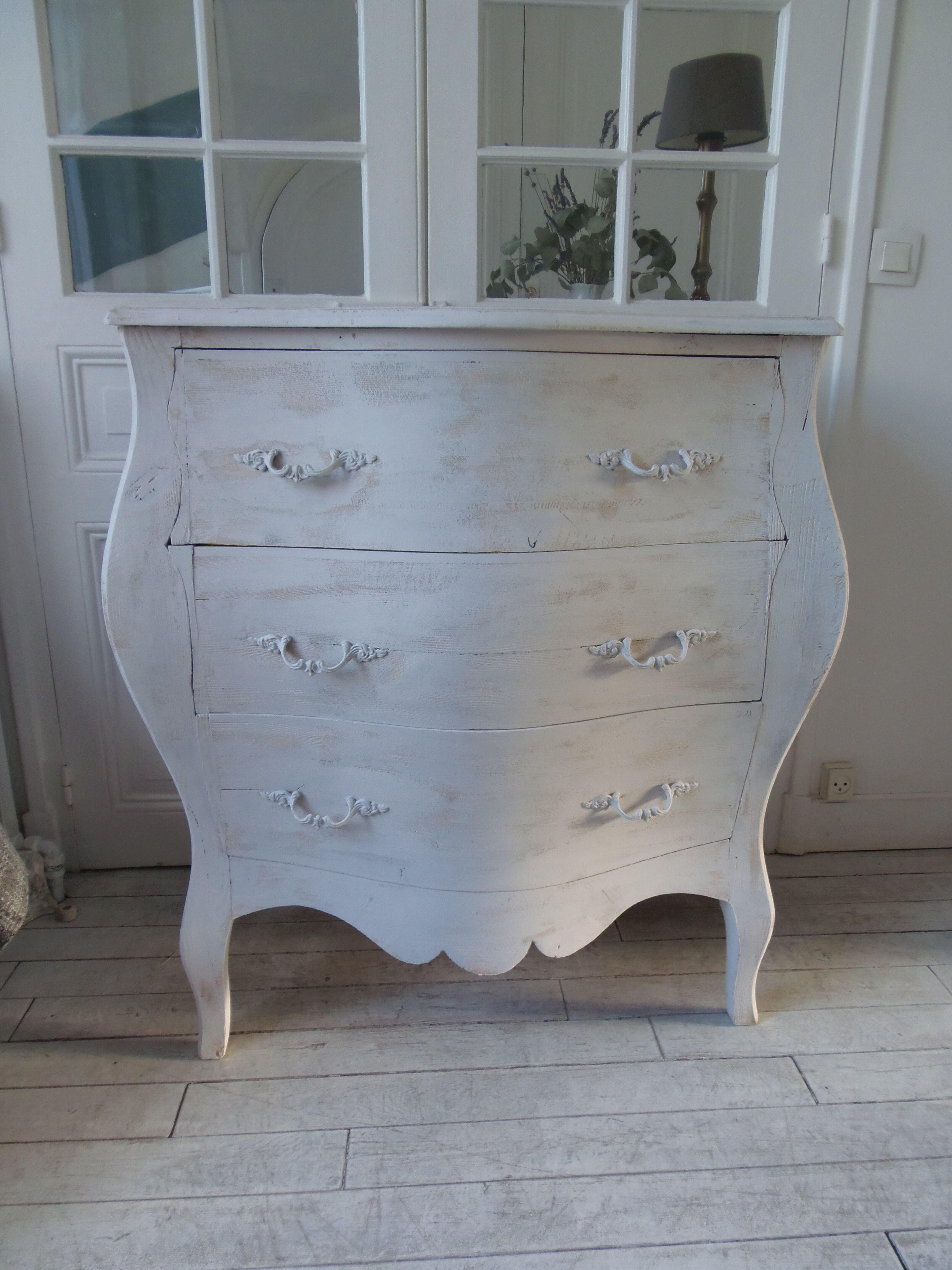 Curved patinated chest of drawers pearl grey waxed finish