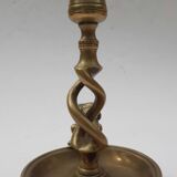 Antique bronze candlestick with dragon-shaped handle from the 17th century