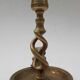 Antique bronze candlestick with dragon-shaped handle from the 17th century