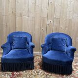 Paire de fauteuils crapaud Napoléon III en velours bleu
