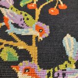 Vintage tapestry framed birds on black background