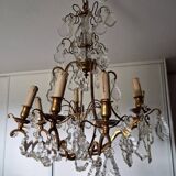 Lustre ancien à 8 bras de lumière à pampilles en bronze et cristal
